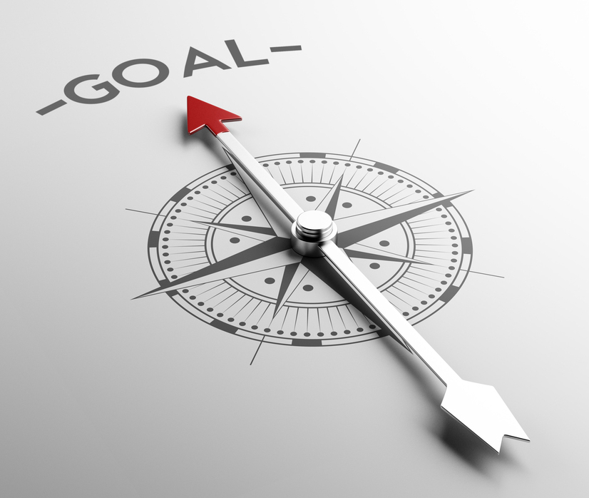 compass pointing to word goal